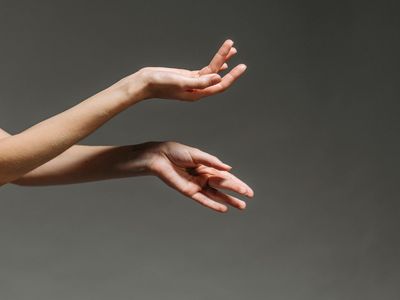 A close-up of hands in a graceful position.