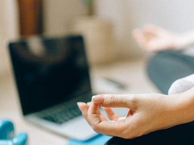 Yoga mat rolled out in a peaceful room.